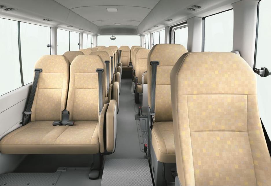 Passenger area of 30 Seater Workers Bus Toyota offering Team Outings across Ras Al Khaimah, praised by passengers