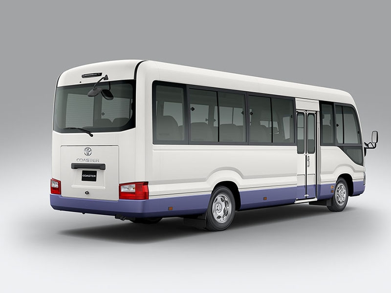Right-side capture of Toyota 30 Seater Workers Bus arranged for Hotel Shuttle in Ras Al Khaimah, popular choice